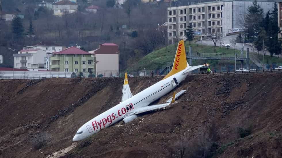 Plane dangles off cliff after skidding off Turkish runway, passengers call safe escape ‘a miracle’